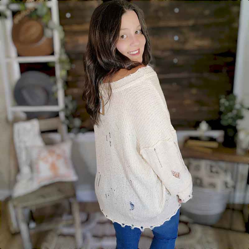 Distressed 2025 cream sweater