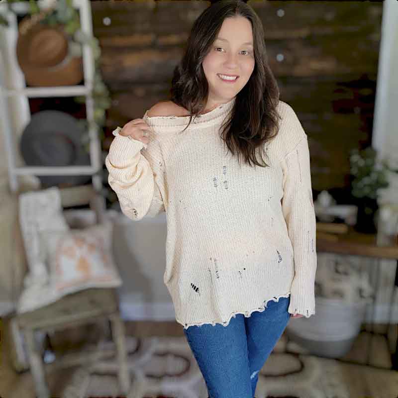 Distressed 2025 cream sweater