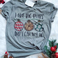 Funny Christmas tee with quote "I like big bulbs and I can not lie" and a sting of different color bulbs.