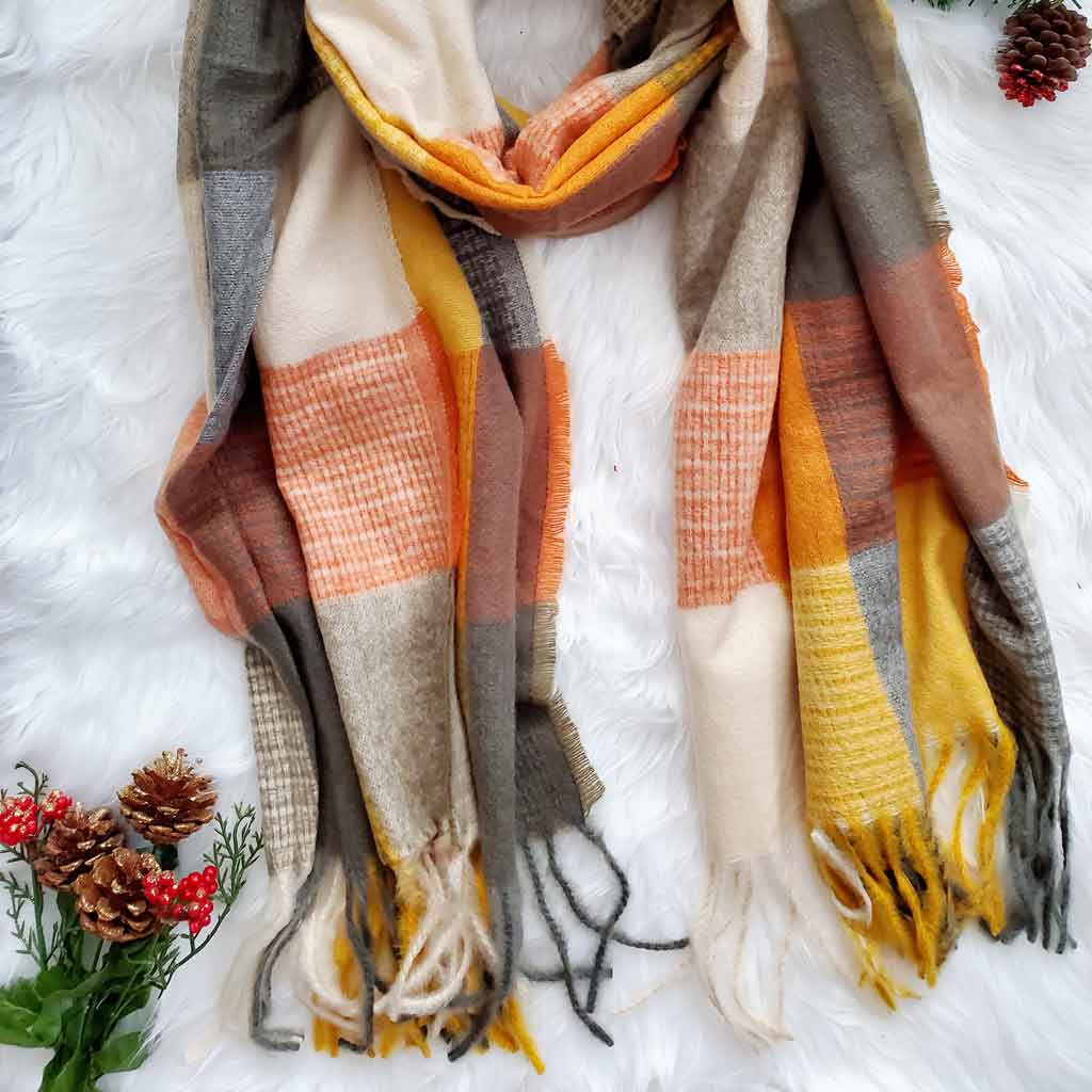 Mustard and olive color plaid scarf.