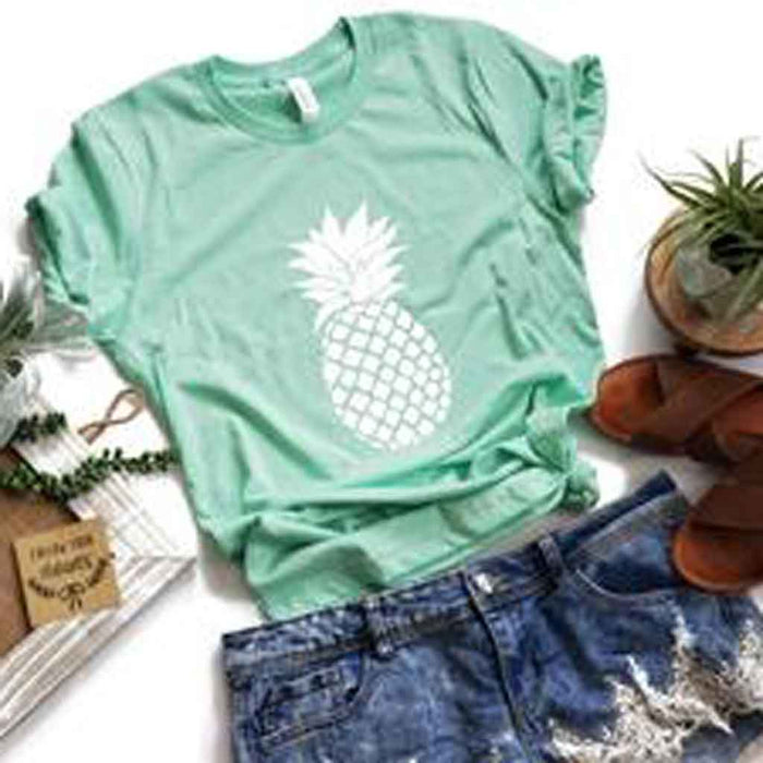 Mint color tee with pineapple image.