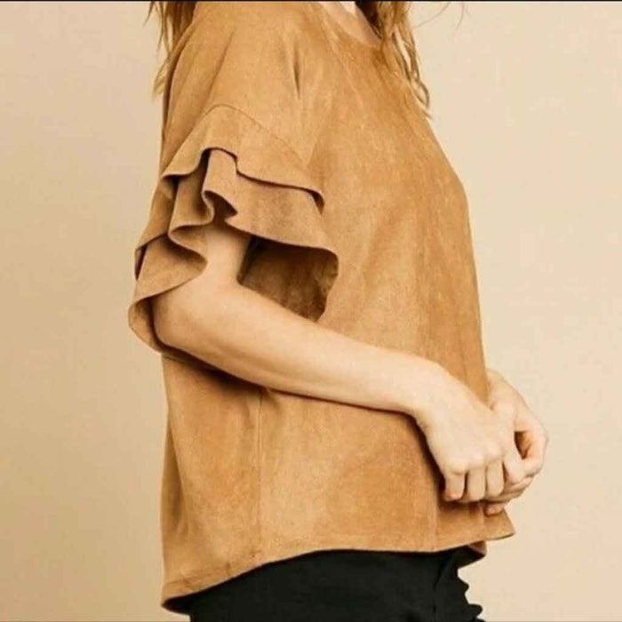 Umgee brand suede style top with ruffled sleeves.