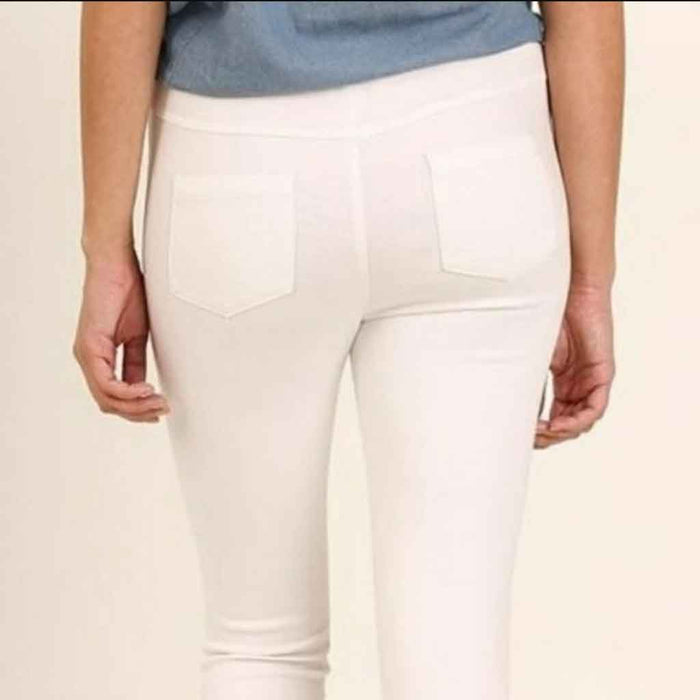 Umgee brand white color moto jeggings, back side.